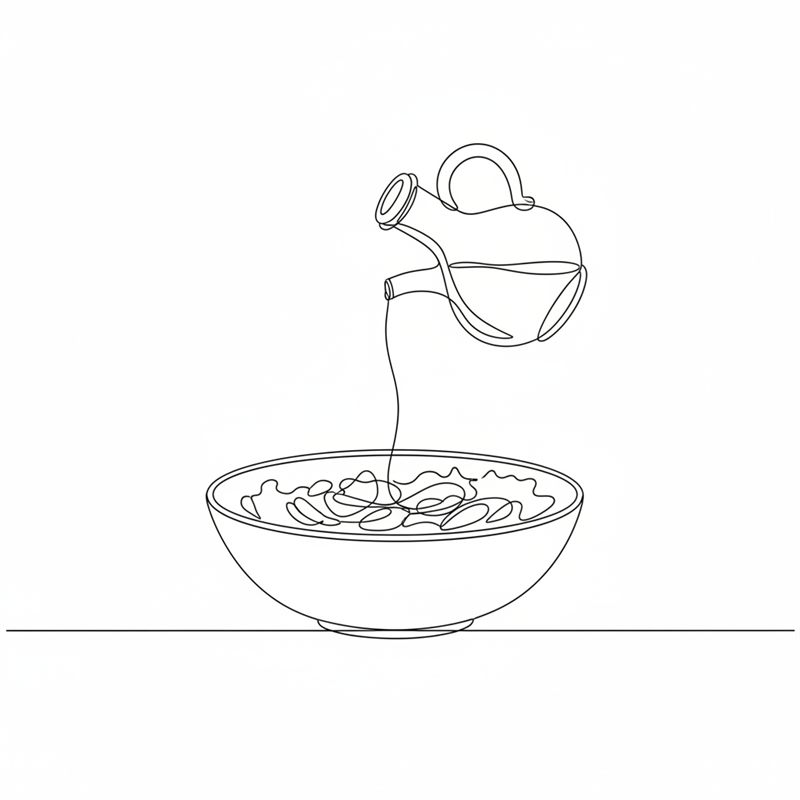 Illustration: balsamicoglaze ringlas från en flaska över den färdiga salladen