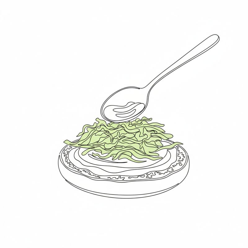 Illustration: dressing breds på hamburgerbrödet och strimlad kål läggs ovanpå