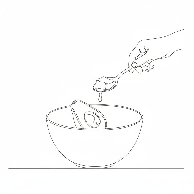 Illustration: färskost rörs ner i den mosade avokadon i en skål