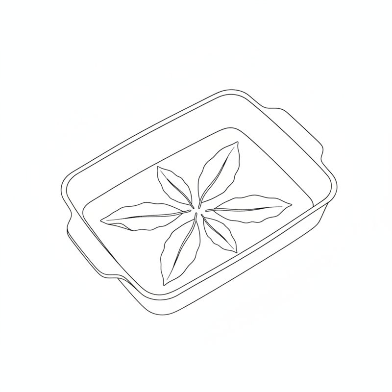 Fem stora lagerblad ligger i stjärnform i botten på en tom, rektangulär ugnsfast form med handtag.